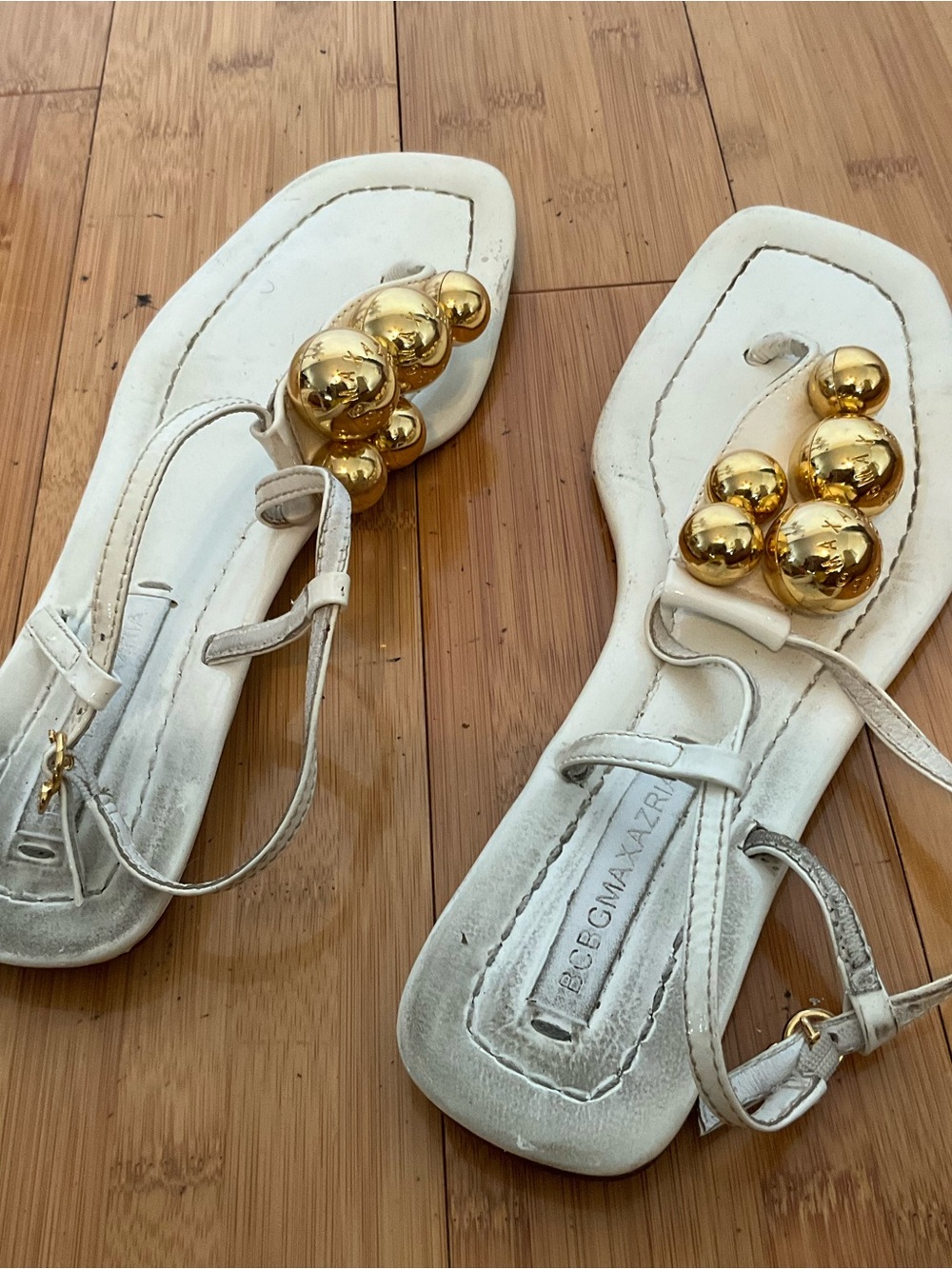 BCBGMaxAzria White Leather Sandals with Gold Orb Accents